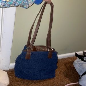 Blue purse with leather trim